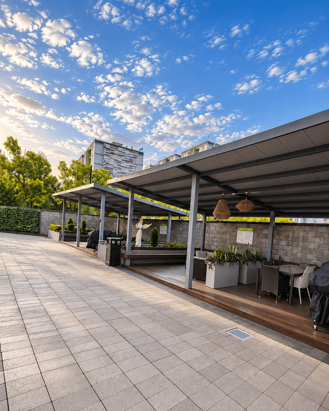 Área social techada con zona de barbacoa y comedor exterior